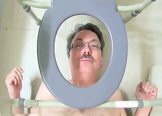 Girl in a schoolgirl skirt is using the submissive lad