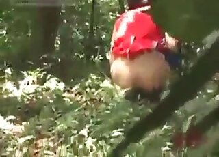 Following a cheerleader while she is pooping